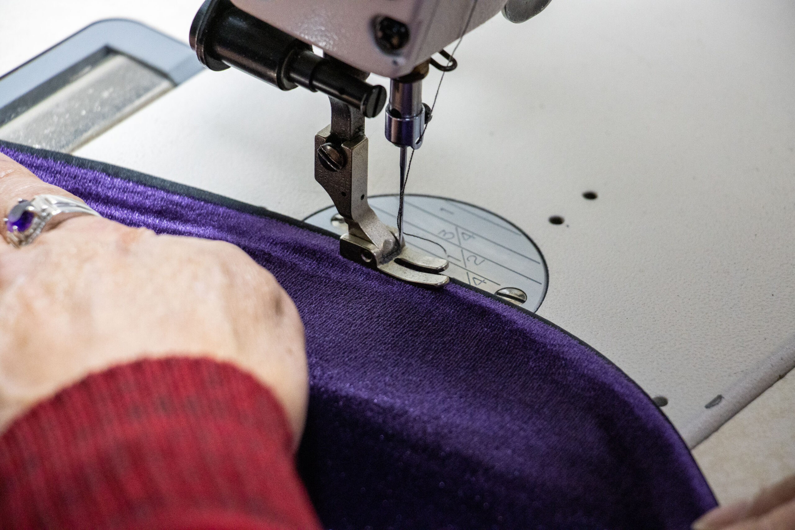 A man tailoring a suit